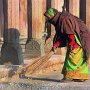 India - Rajasthan - Woman cleaning at step well